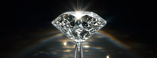 Diamond grading scale showing clarity, color, and carat quality factors