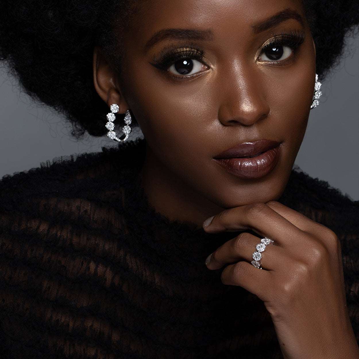 Model Wearing Pair of Illusion Set Diamond White Gold Hoop Earrings