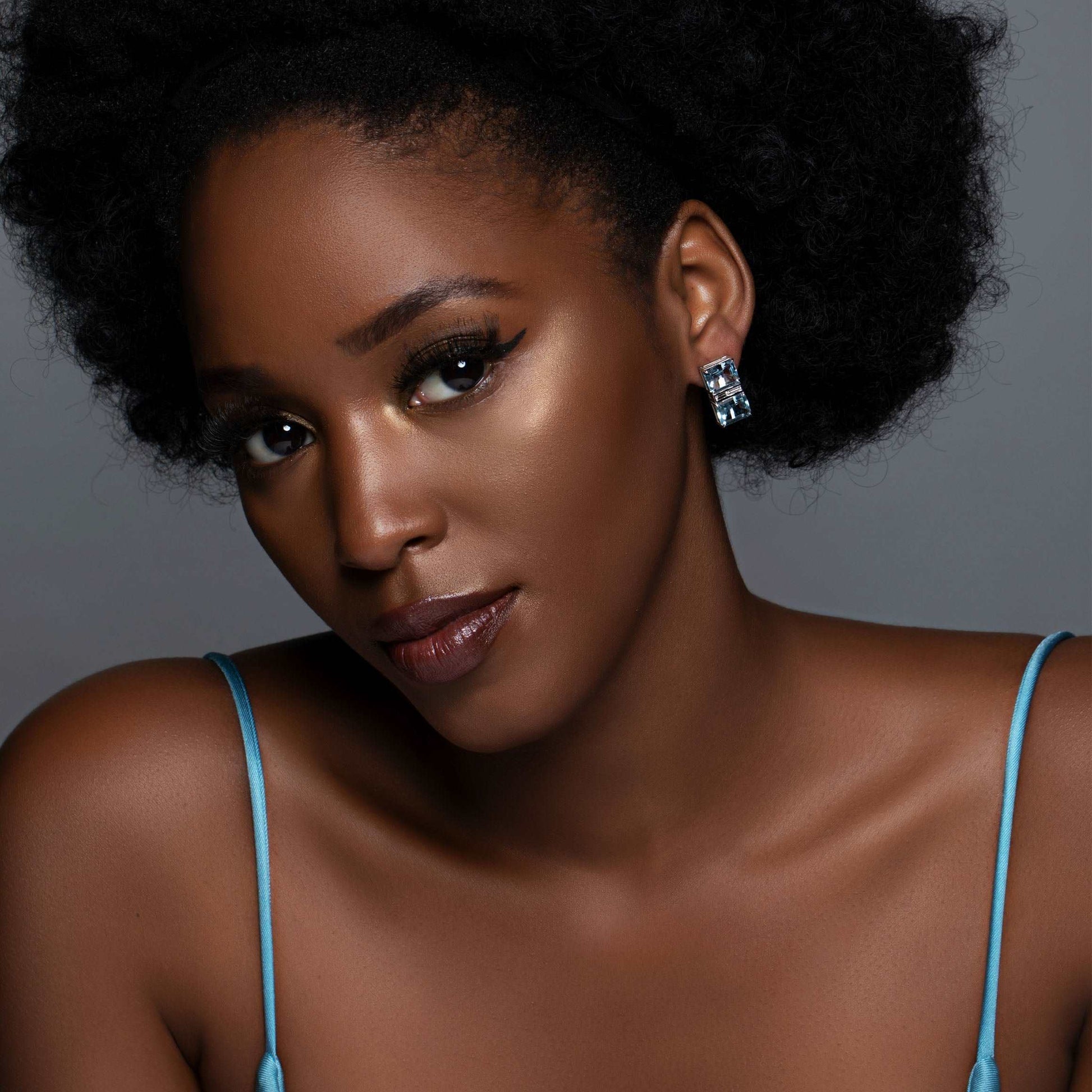 Model Wearing Aquamarine & Diamond Deco Gold Earrings