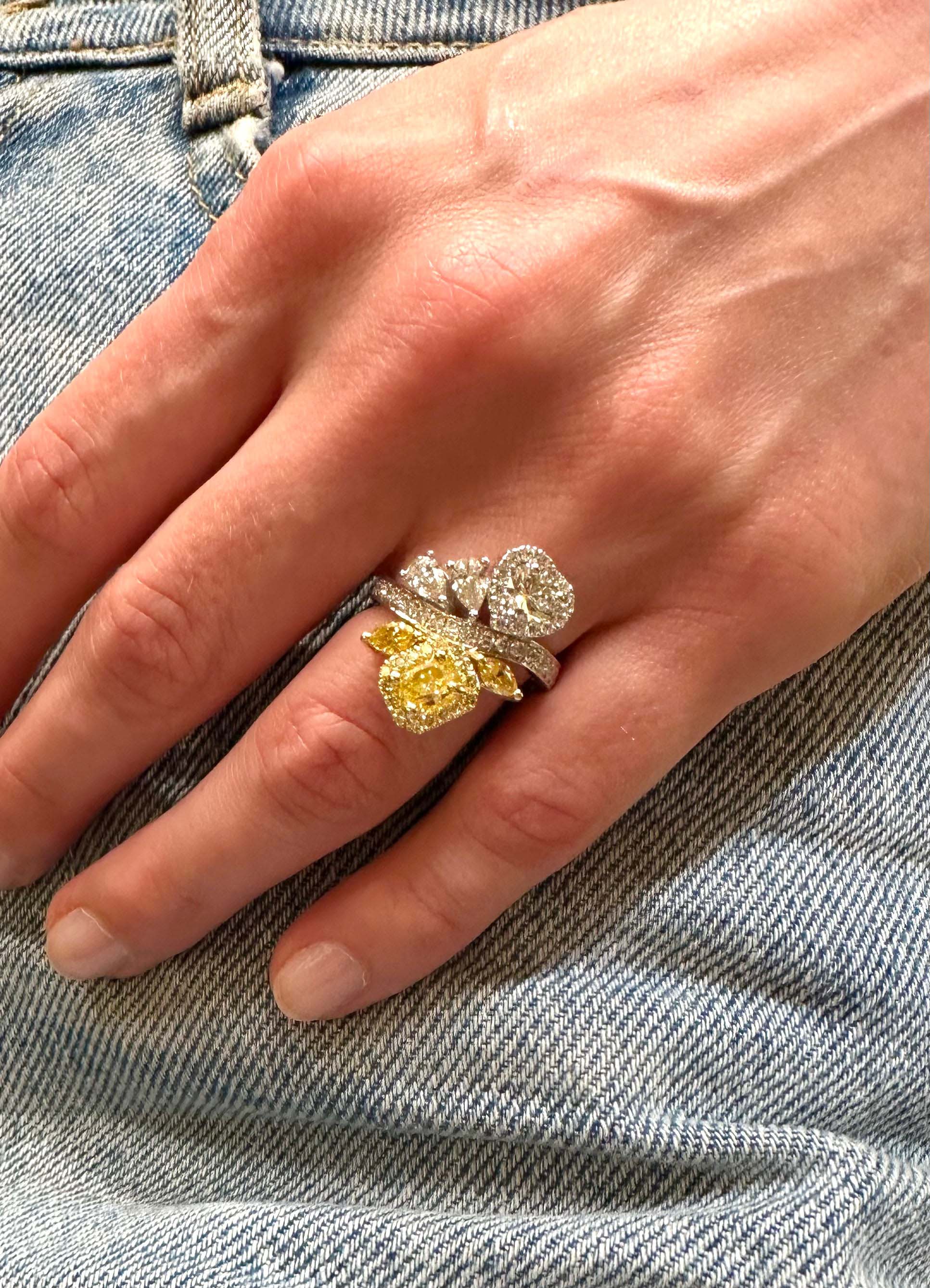 Toi-et-Moi Canary Diamond Gold Ring on a finger