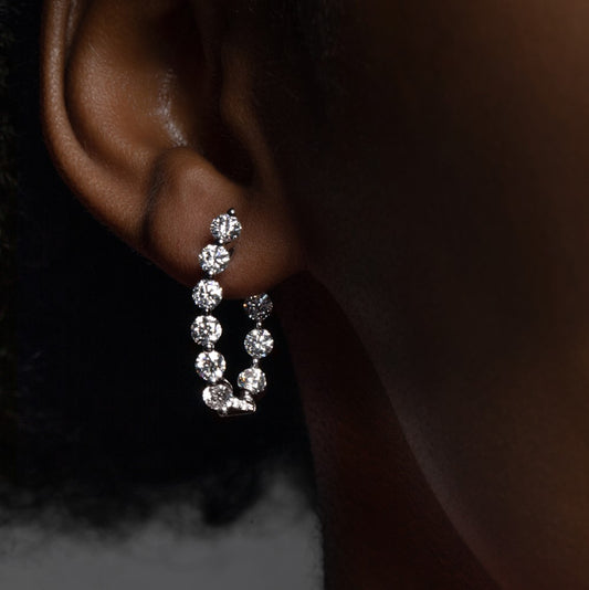 Model wearing Diamond White Gold Large Hoop Earrings