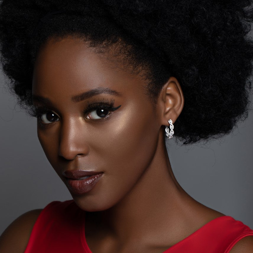 Model Wearing Diamond Intertwined White Gold Small Hoop Earrings