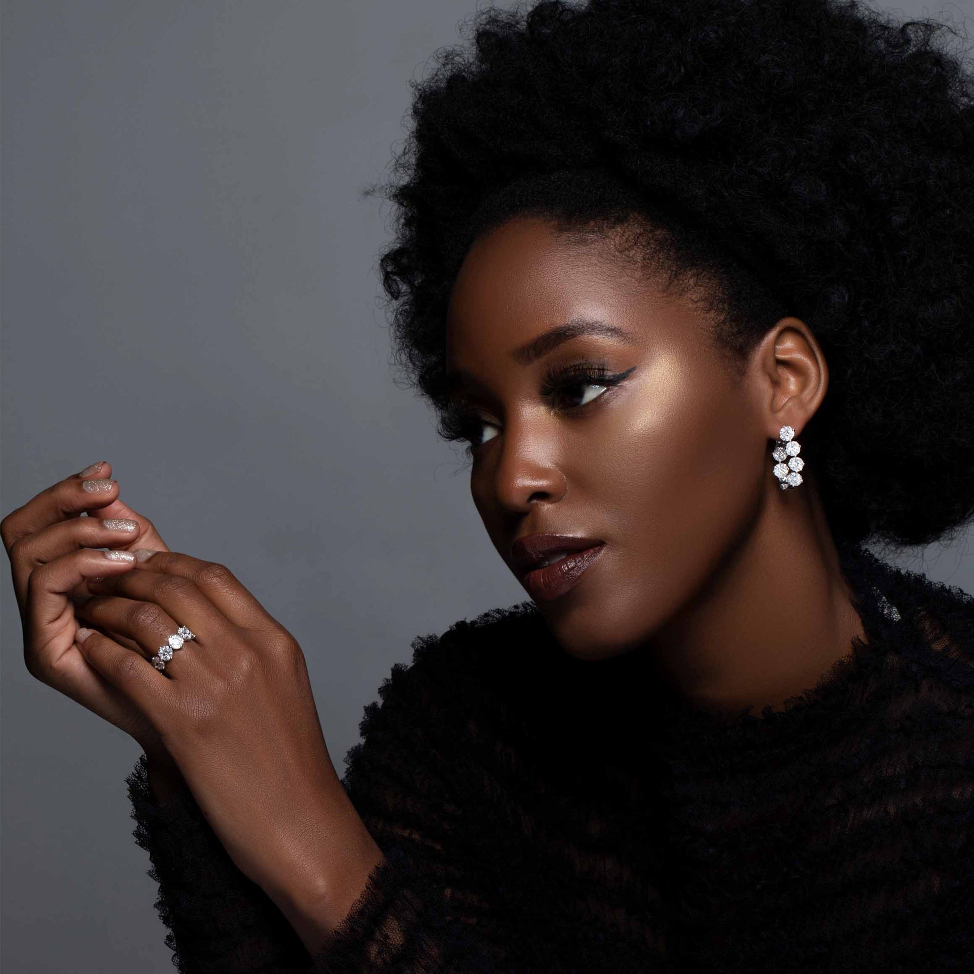 Model Wearing Pair of Illusion Set Diamond White Gold Hoop Earrings