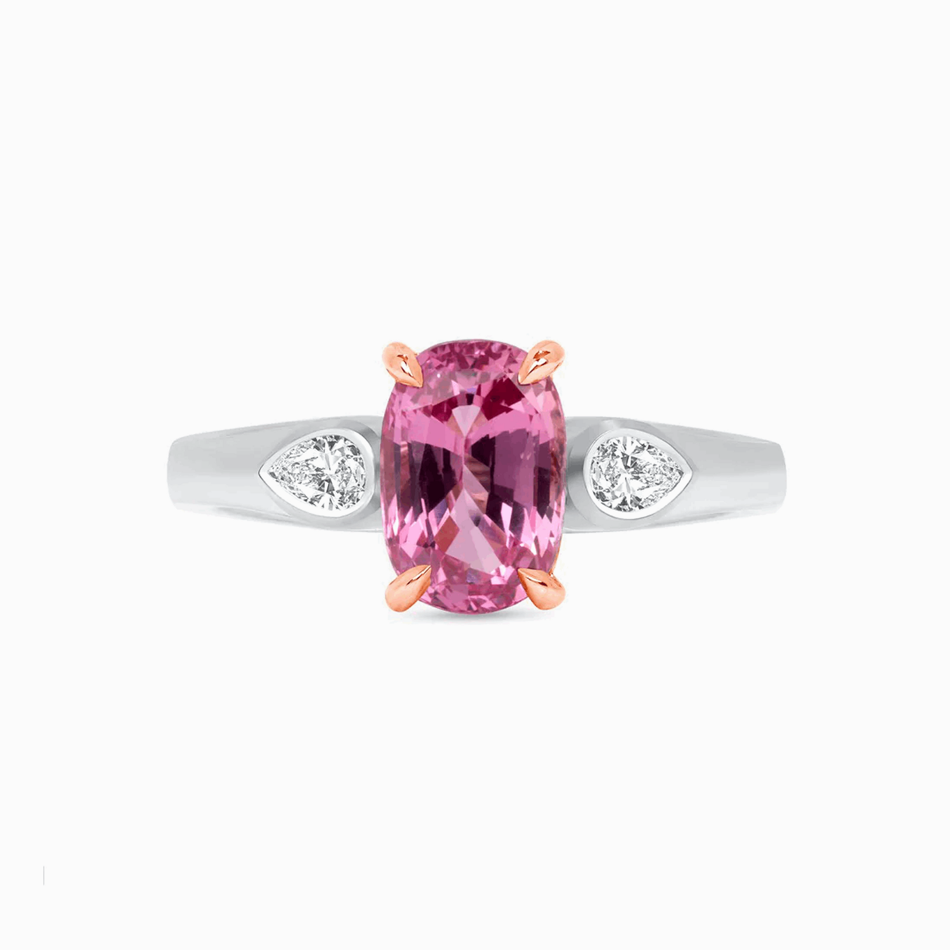 Untreated Pink Sapphire & Diamond Gold Ring on a white background