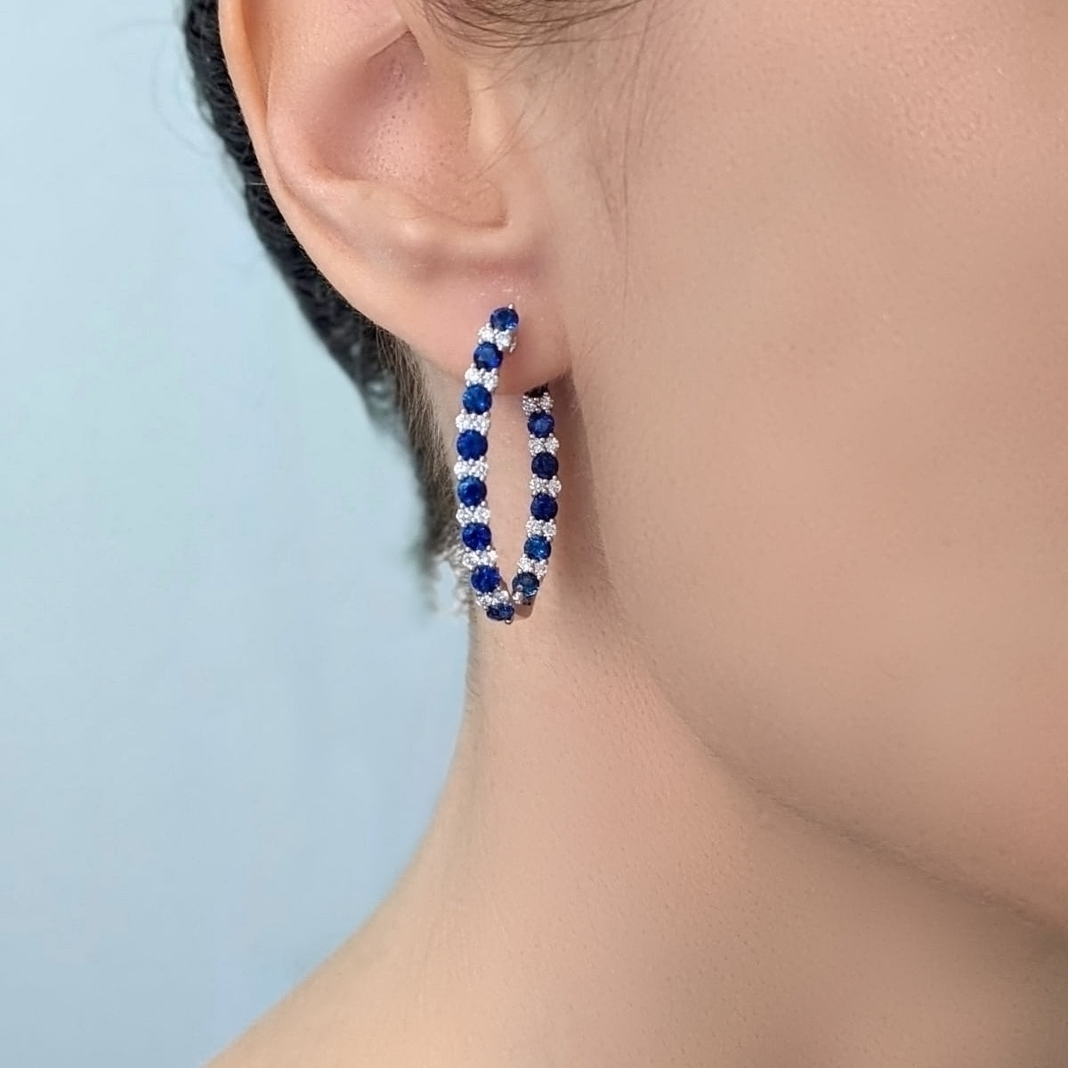 Model Wearing Sapphire and Diamond Hoop Earrings