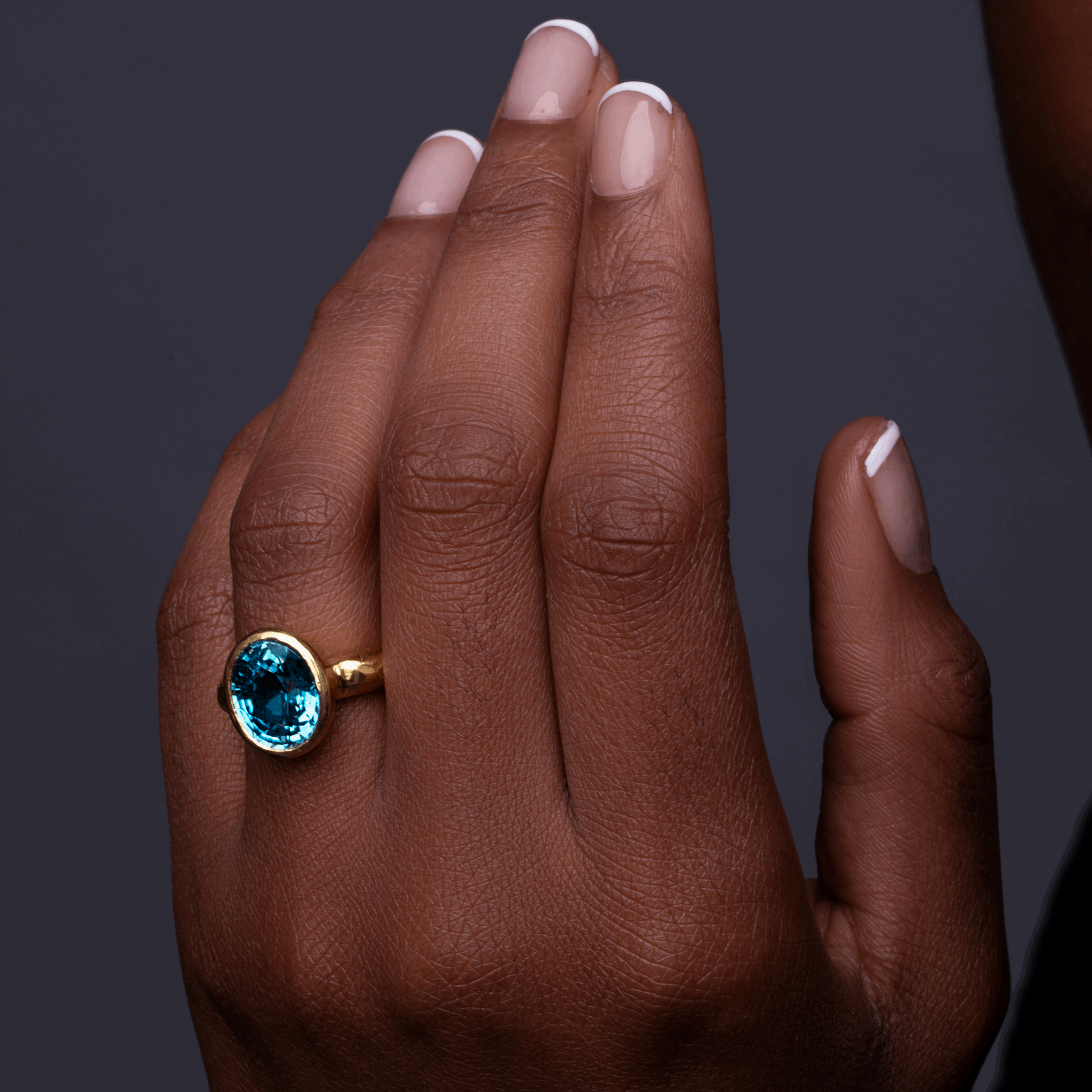 Model Wearing Blue Zircon Gold Ring