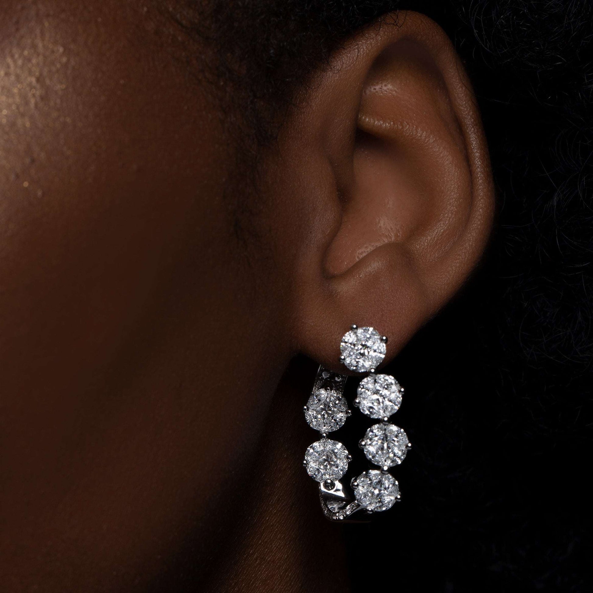 Model Wearing Pair of Illusion Set Diamond White Gold Hoop Earrings