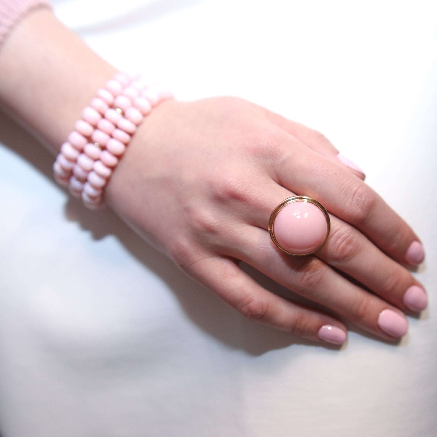 Model Wearing Pink Opal Bracelet/Necklace with Yellow Gold Toggle Clasp