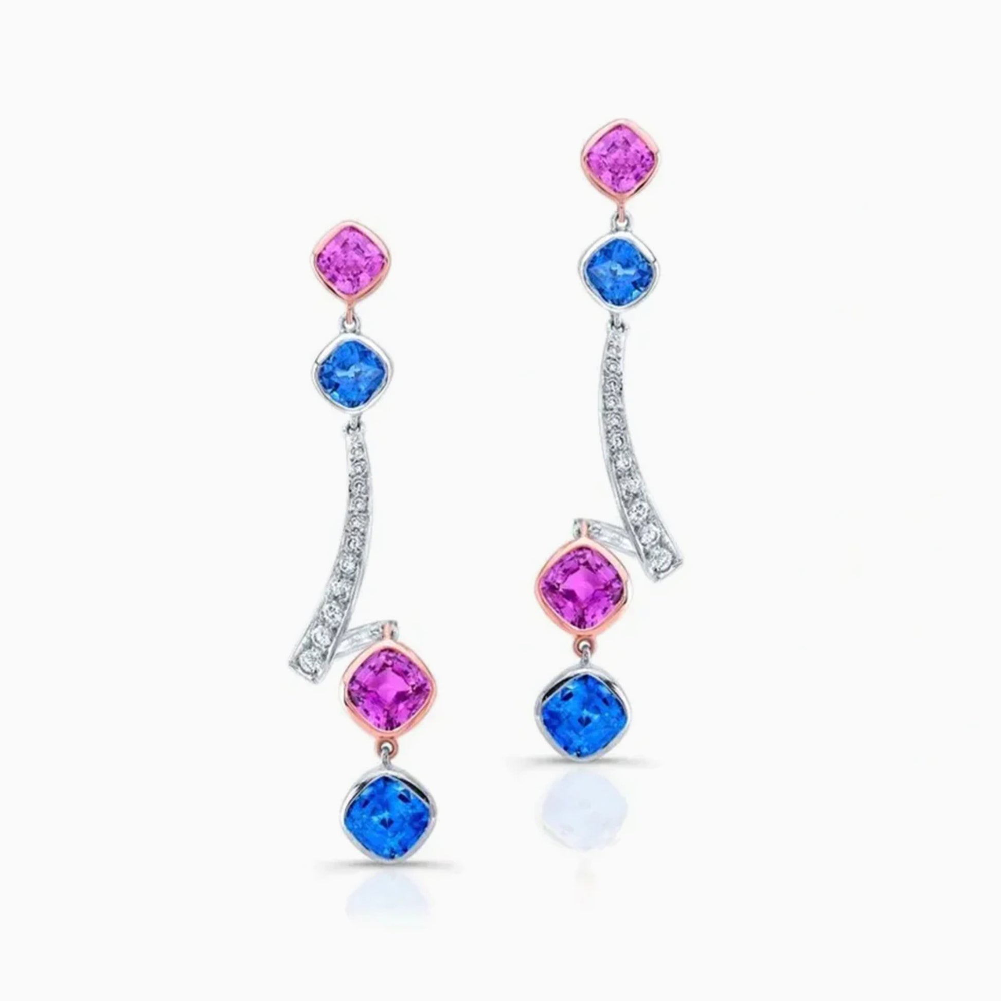 Blue & Pink Sapphire Earrings on a white background