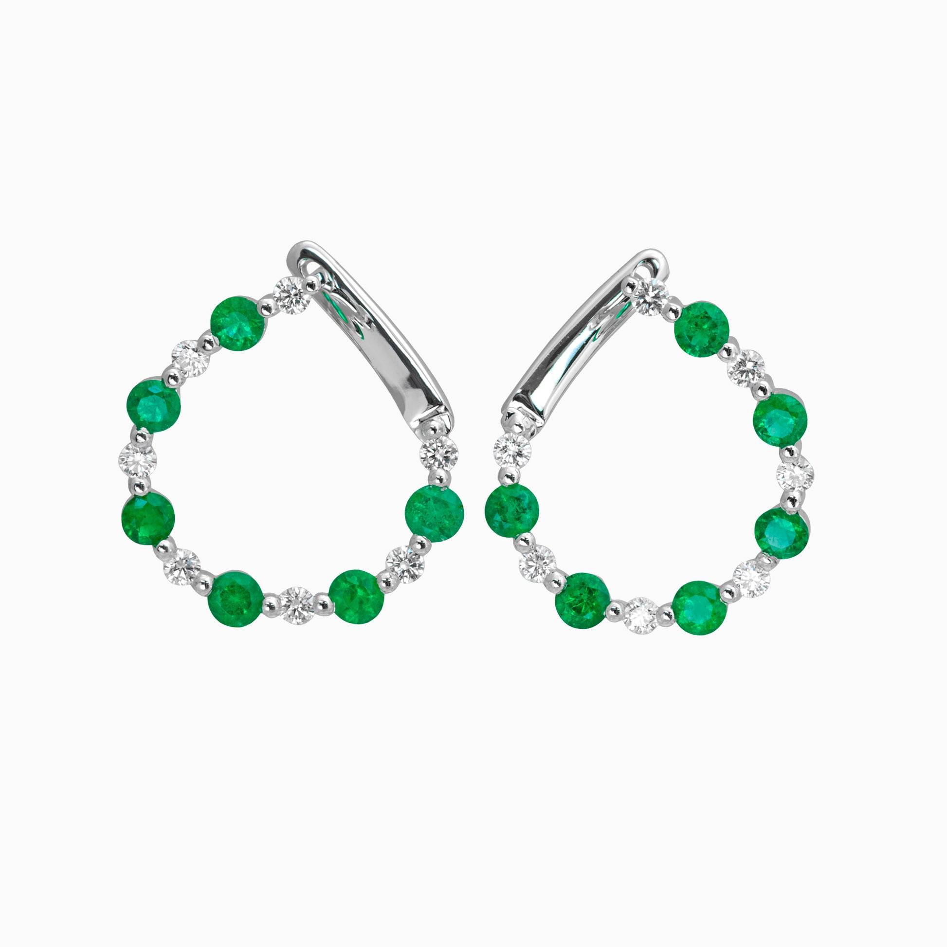 Emerald and Diamond Round Hoop Earrings on a white background
