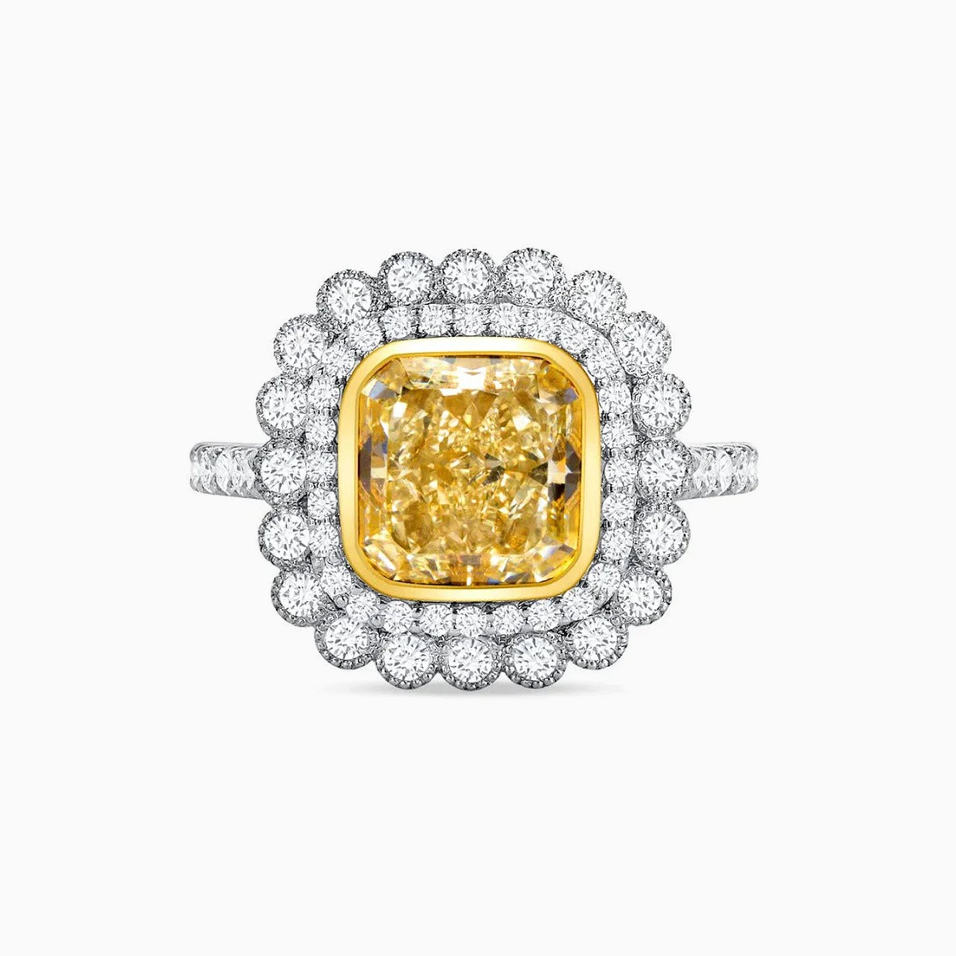 Fancy Yellow Diamond Platinum Ring on a white background