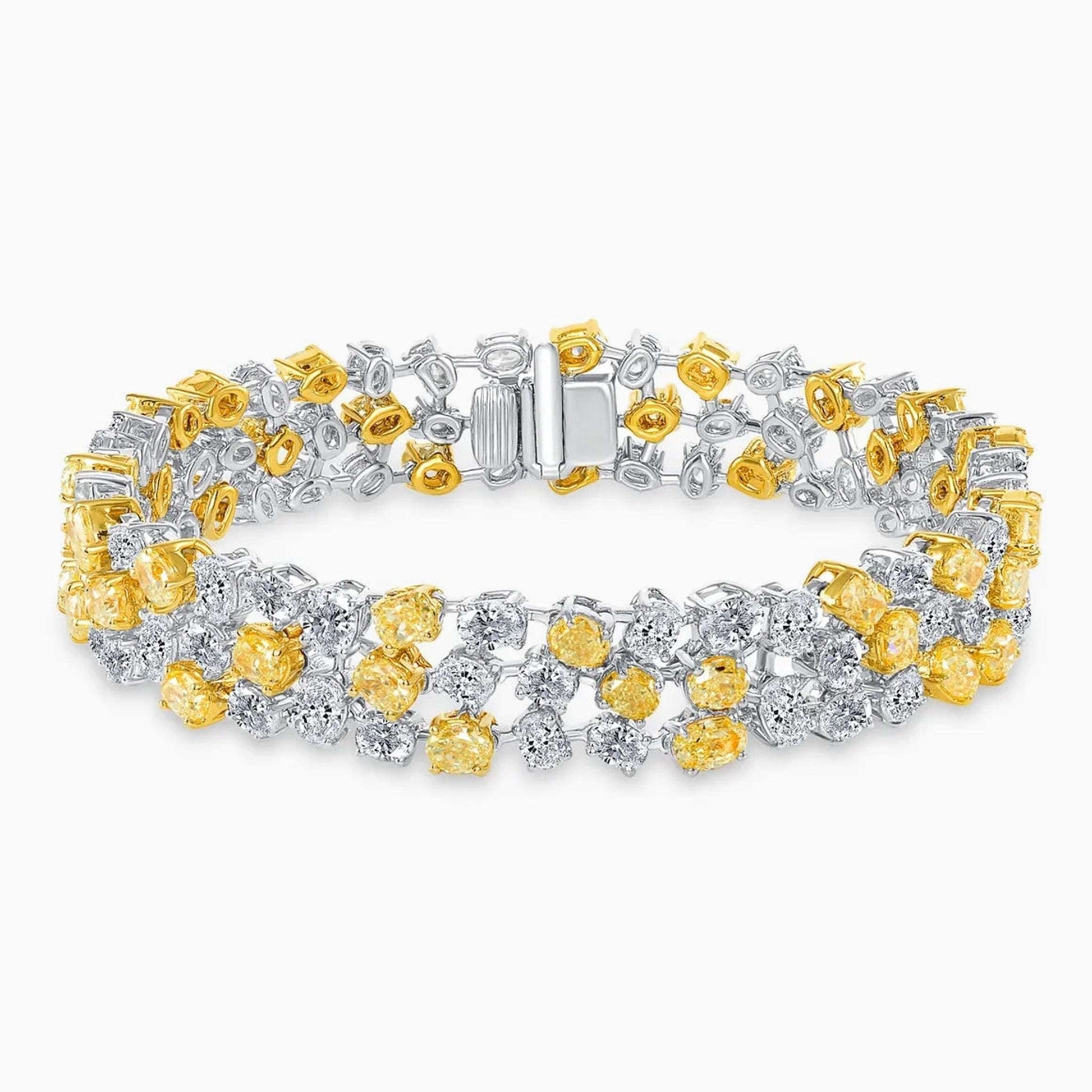 Fancy Yellow & White Diamonds Gold Bracelet on a white background