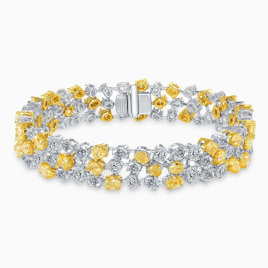 Fancy Yellow & White Diamonds Gold Bracelet on a white background