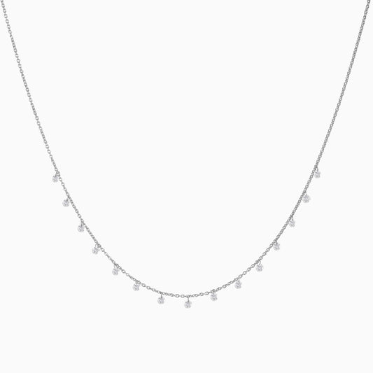 Floating Diamonds Necklace in White Gold on a white background