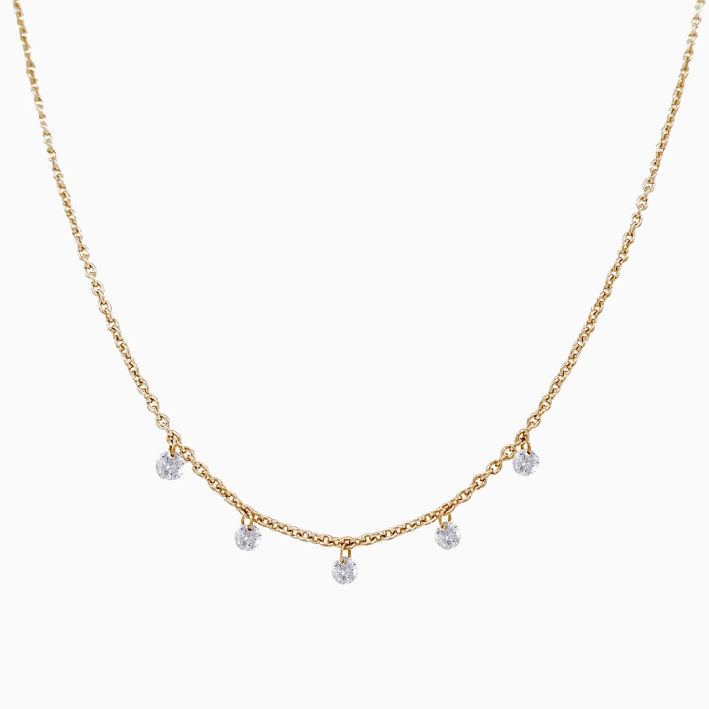 Floating Five Diamond Necklace in Yellow Gold on a white background