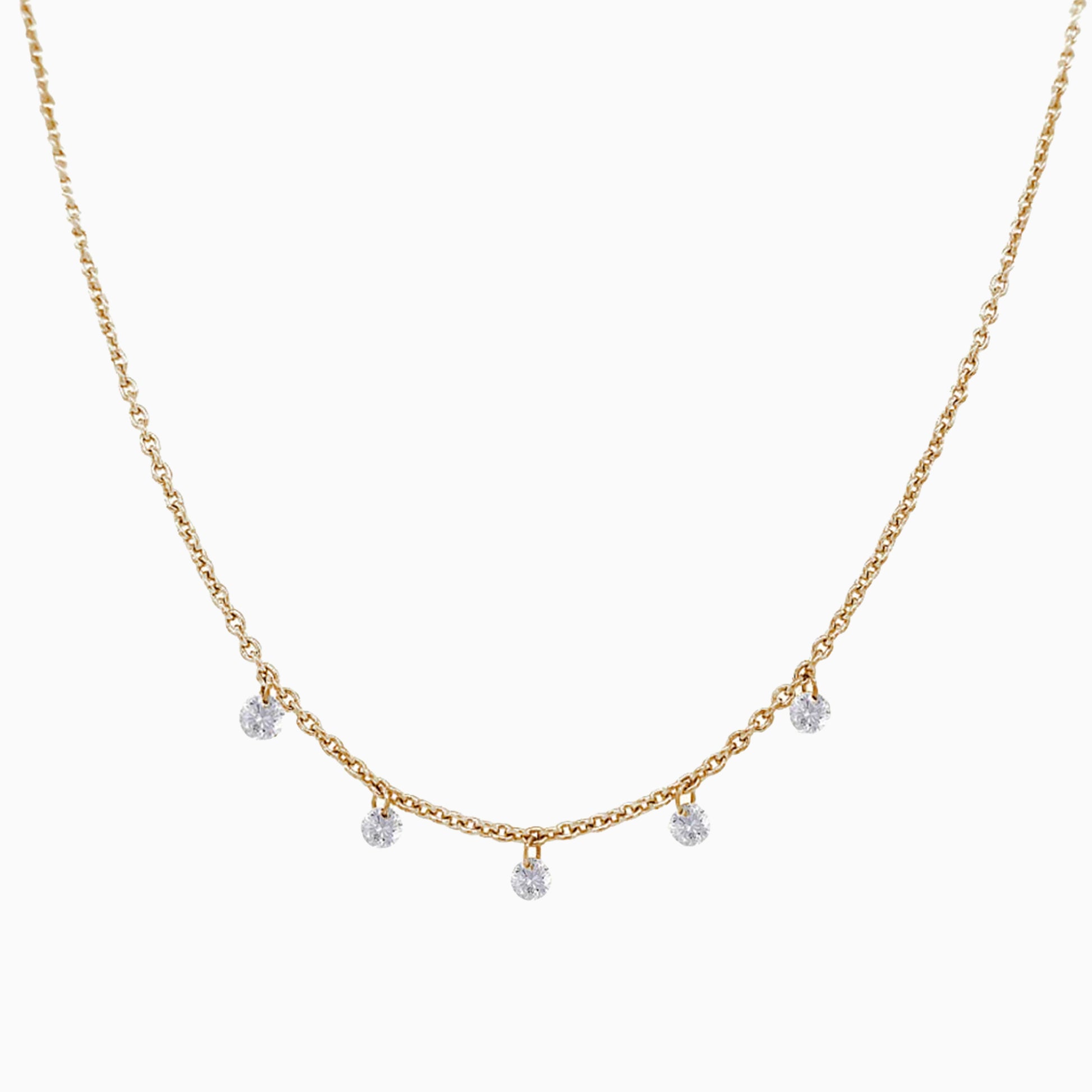 Floating Five Diamond Necklace in Yellow Gold on a white background