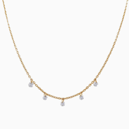 Floating Five Diamond Necklace in Yellow Gold on a white background