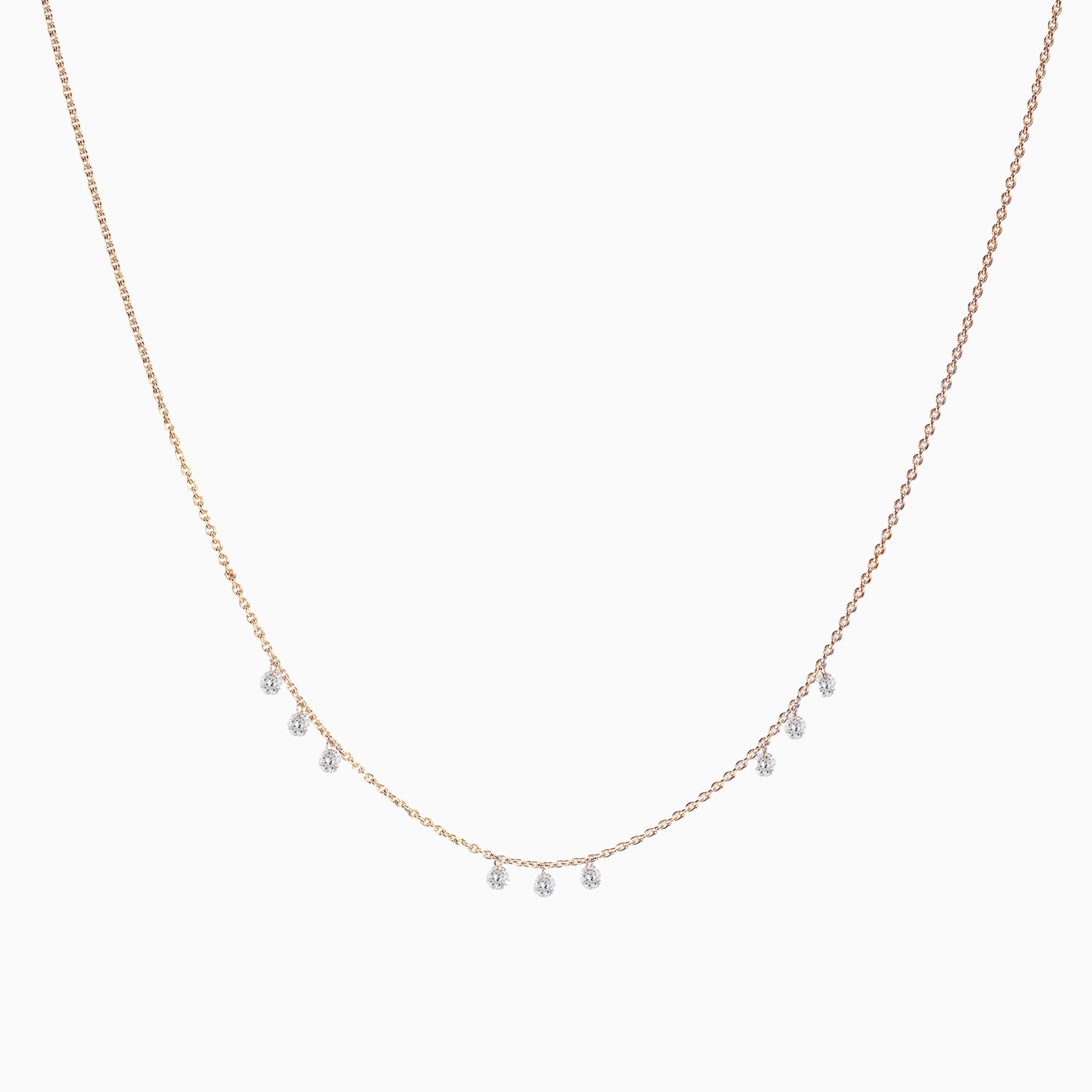 Floating Nine Diamonds Necklace in Rose Gold on a white background
