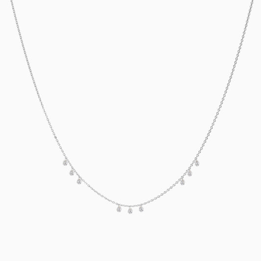 Floating Nine Diamonds Necklace in White Gold on a white background