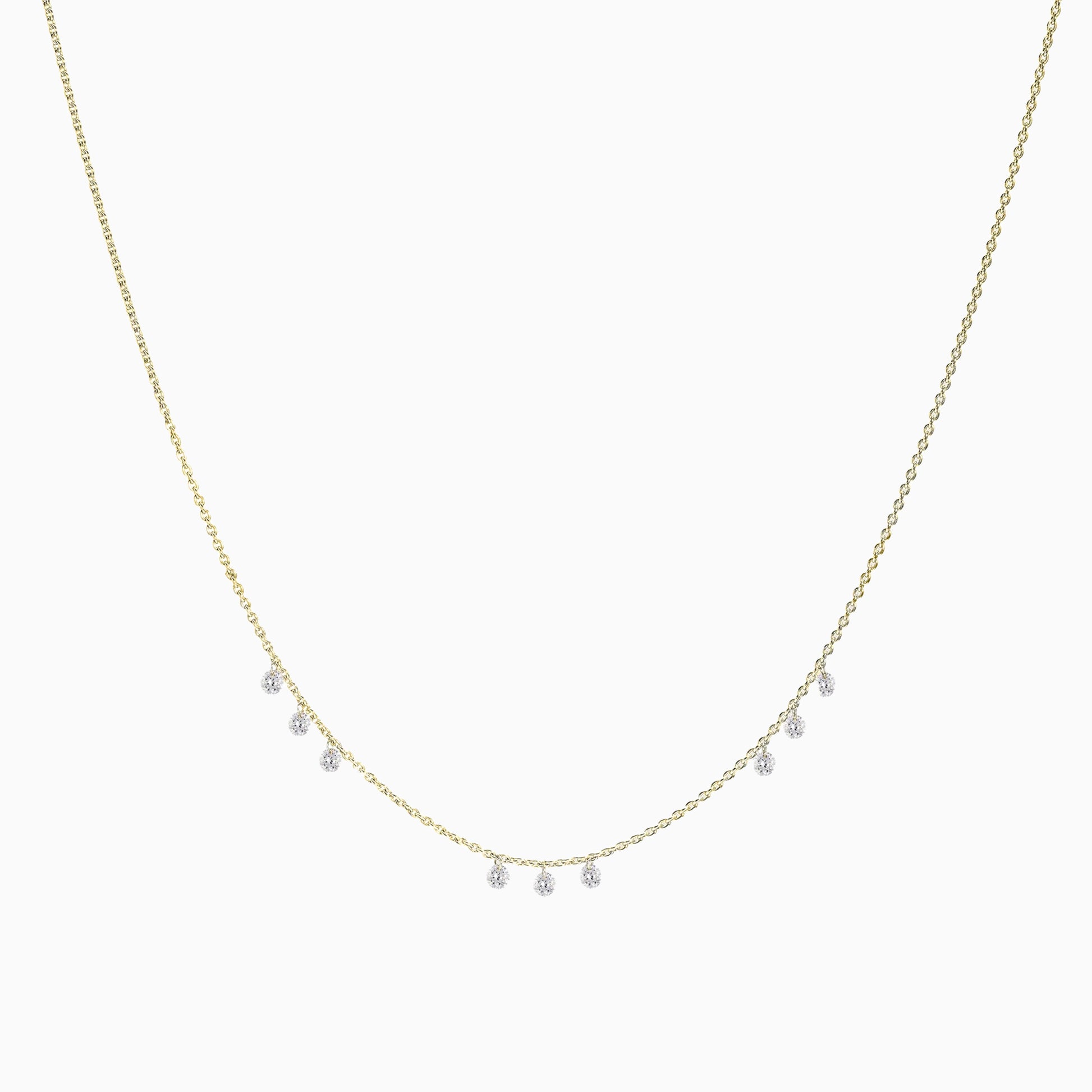 Floating Nine Diamonds Necklace in Yellow Gold on a white background
