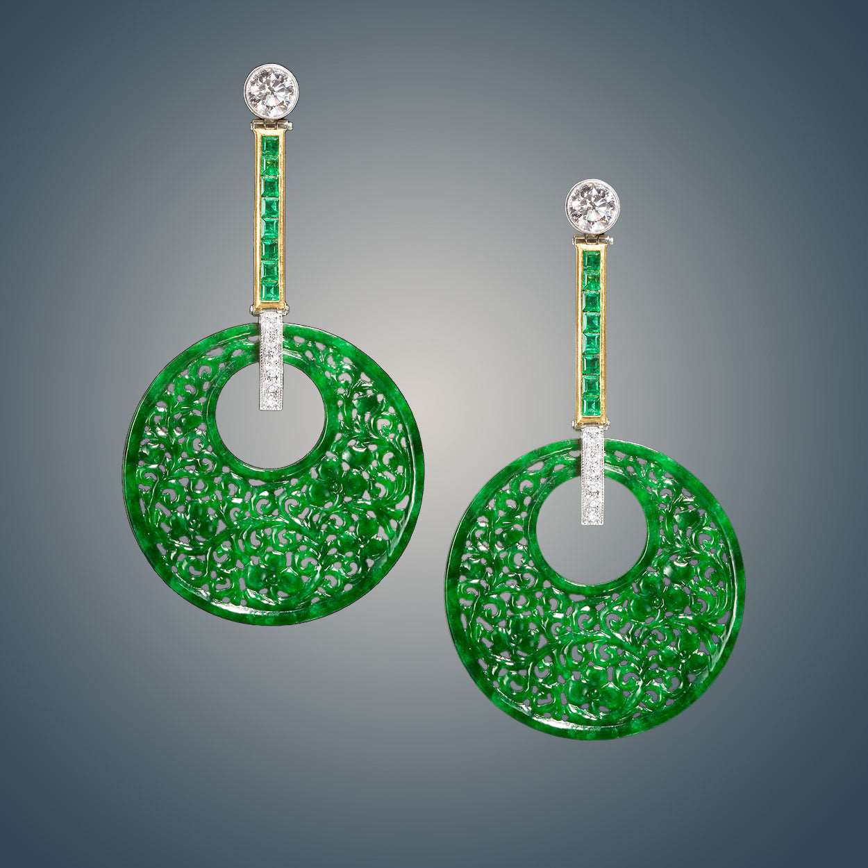 Green Jade Emerald & Diamond Platinum Earrings on a grey background