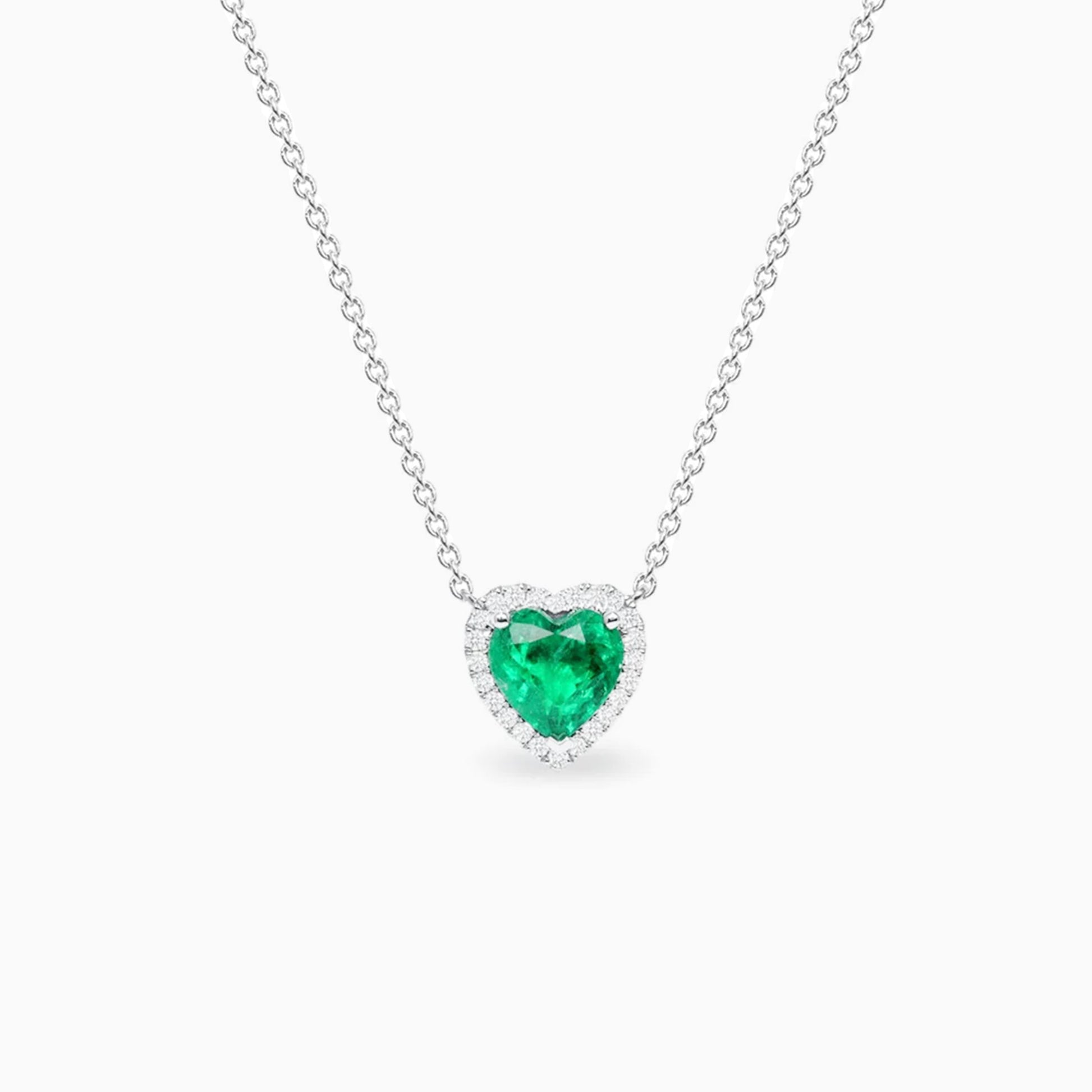 Heart Shape Emerald Diamond White Gold Pendant on a white background