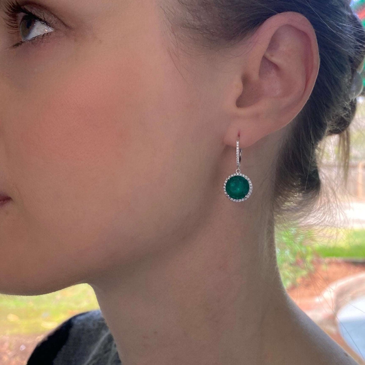 Model Wearing Emerald and Diamond Gold Drop Earrings