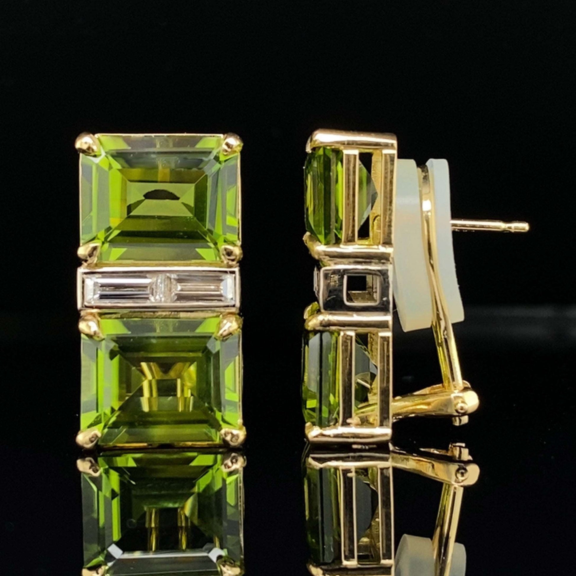 Peridot & Diamond Gold Earrings on a black background