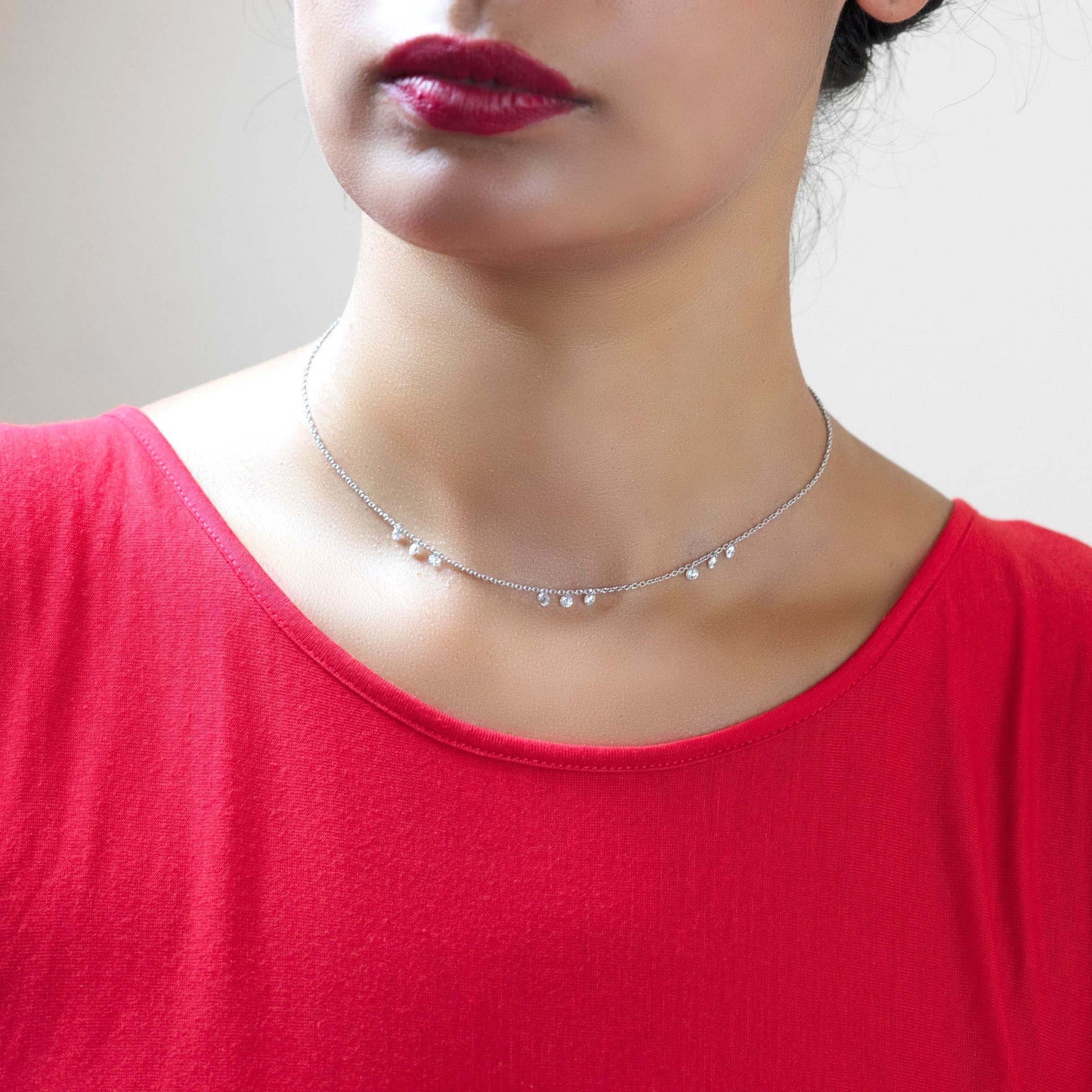 Model Wearing Floating Nine Diamonds Necklace in White Gold