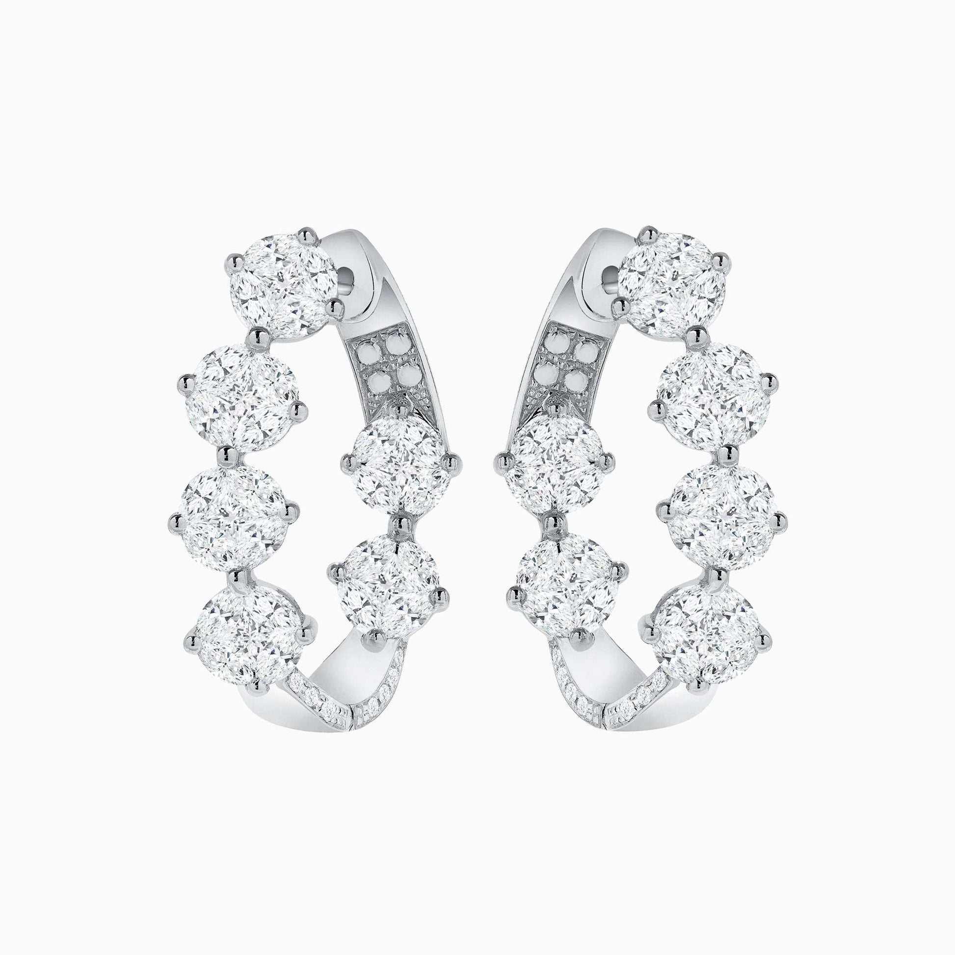 Pair of Illusion Set Diamond White Gold Hoop Earrings on a white background