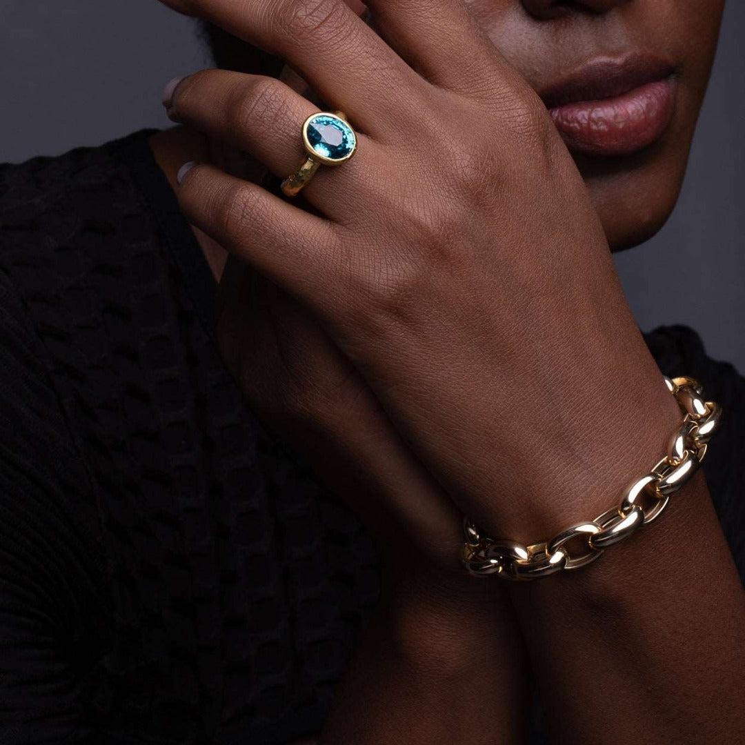 Model Wearing Open Link Gold Bracelet