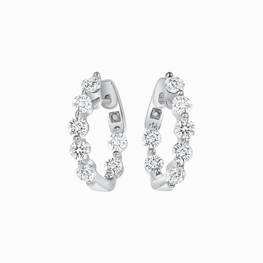 Diamond White Gold Medium Hoop Earrings on a white background