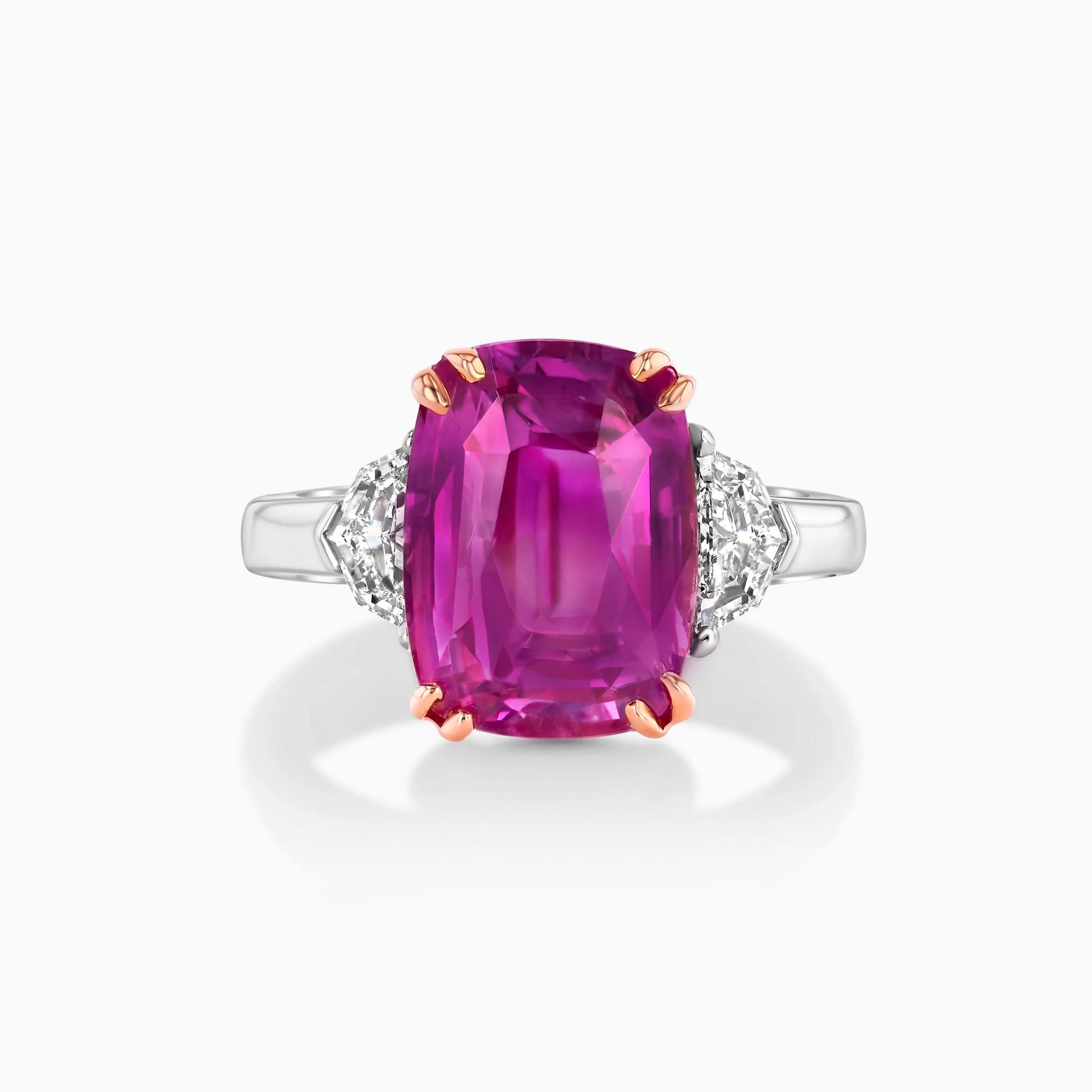 Raspberry Pink Sapphire and Diamonds Platinum Ring on a white background