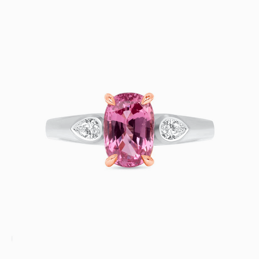 Untreated Pink Sapphire & Diamond Gold Ring on a white background