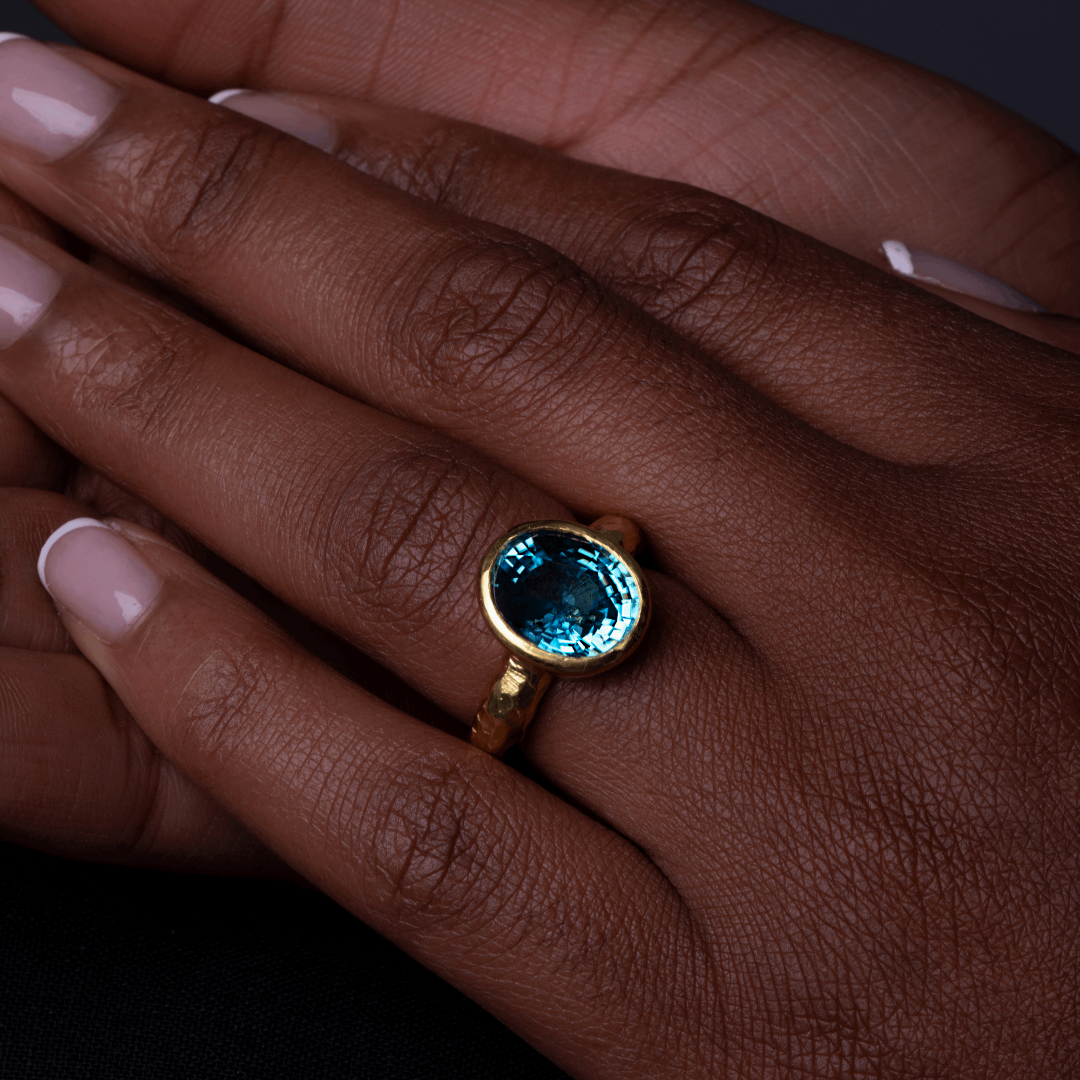 Model Wearing Blue Zircon Gold Ring