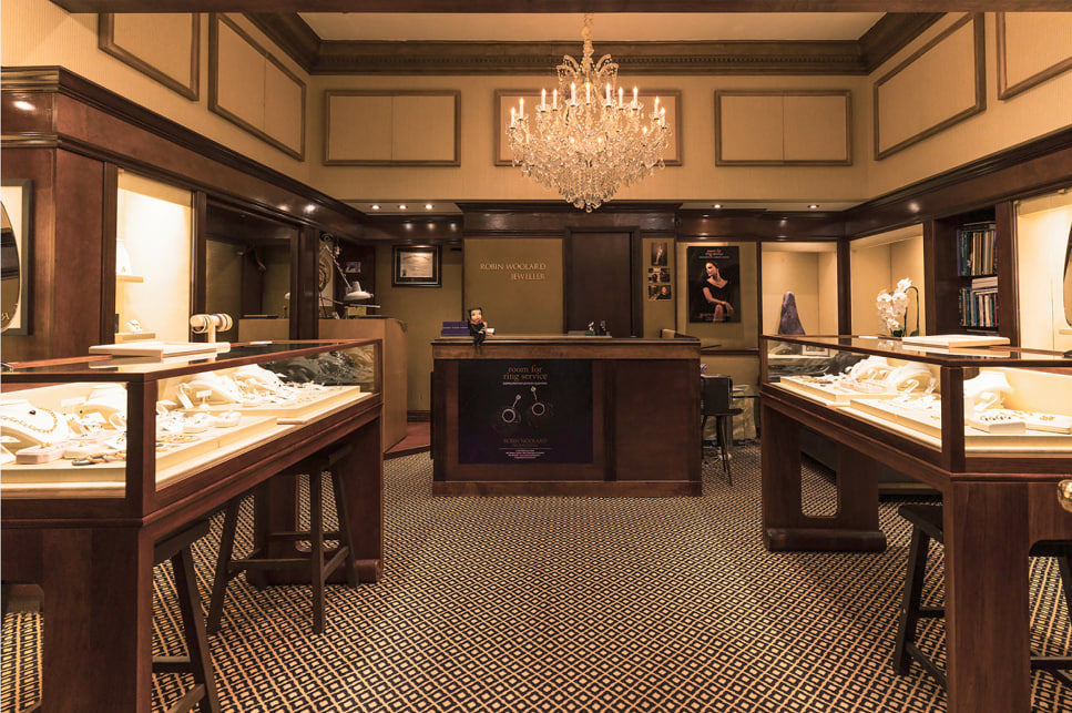 Elegant jewelry store interior with display cases.