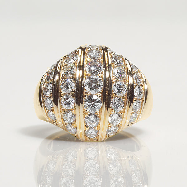 View from the front: A yellow gold ring with diamonds set in 5 vertical rows, part of the Etruscan Revival Collection.