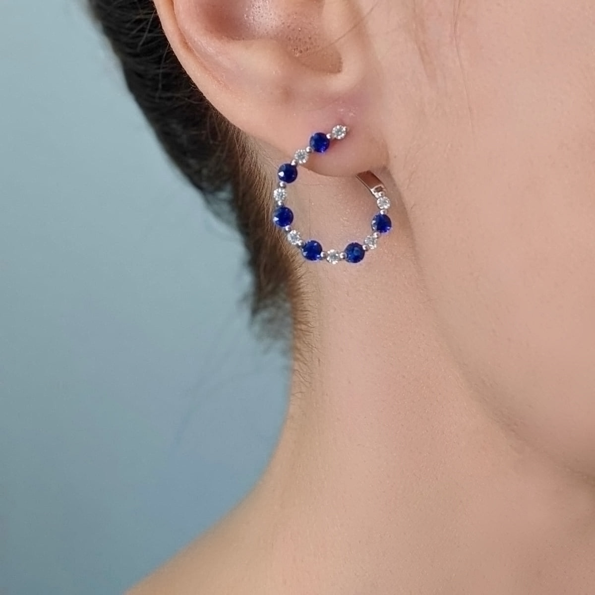Model Wearing Sapphire & Diamond Round Hoop Earrings